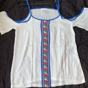 Brand new shirt with a beautiful traditional motif